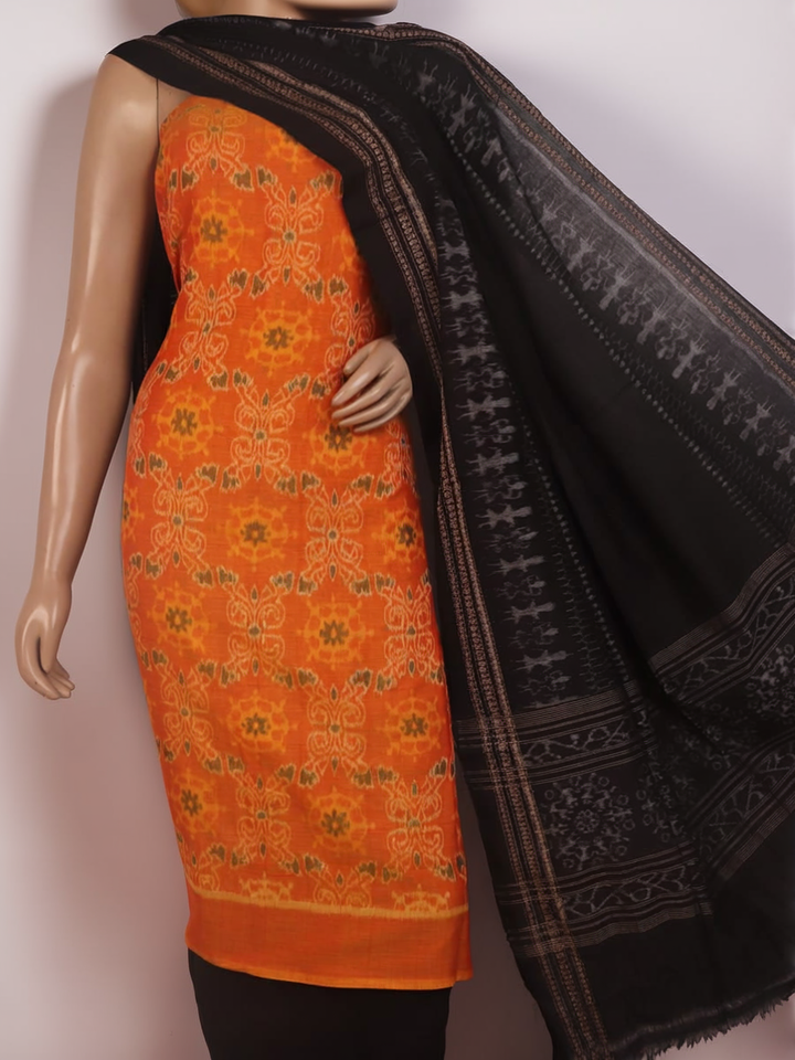 Blouse piece of yellow and black Sambalpuri cotton dress material with motifs.