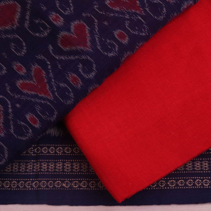 Blouse piece detail of blue & red Sambalpuri cotton dress material with motifs.