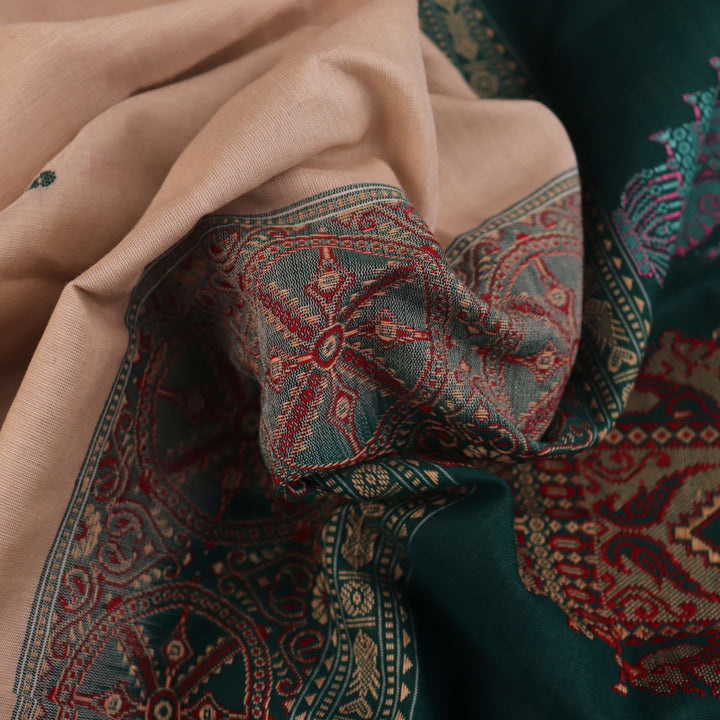 Full view of a cream and green cotton Bomkai Saree with butta pattern.