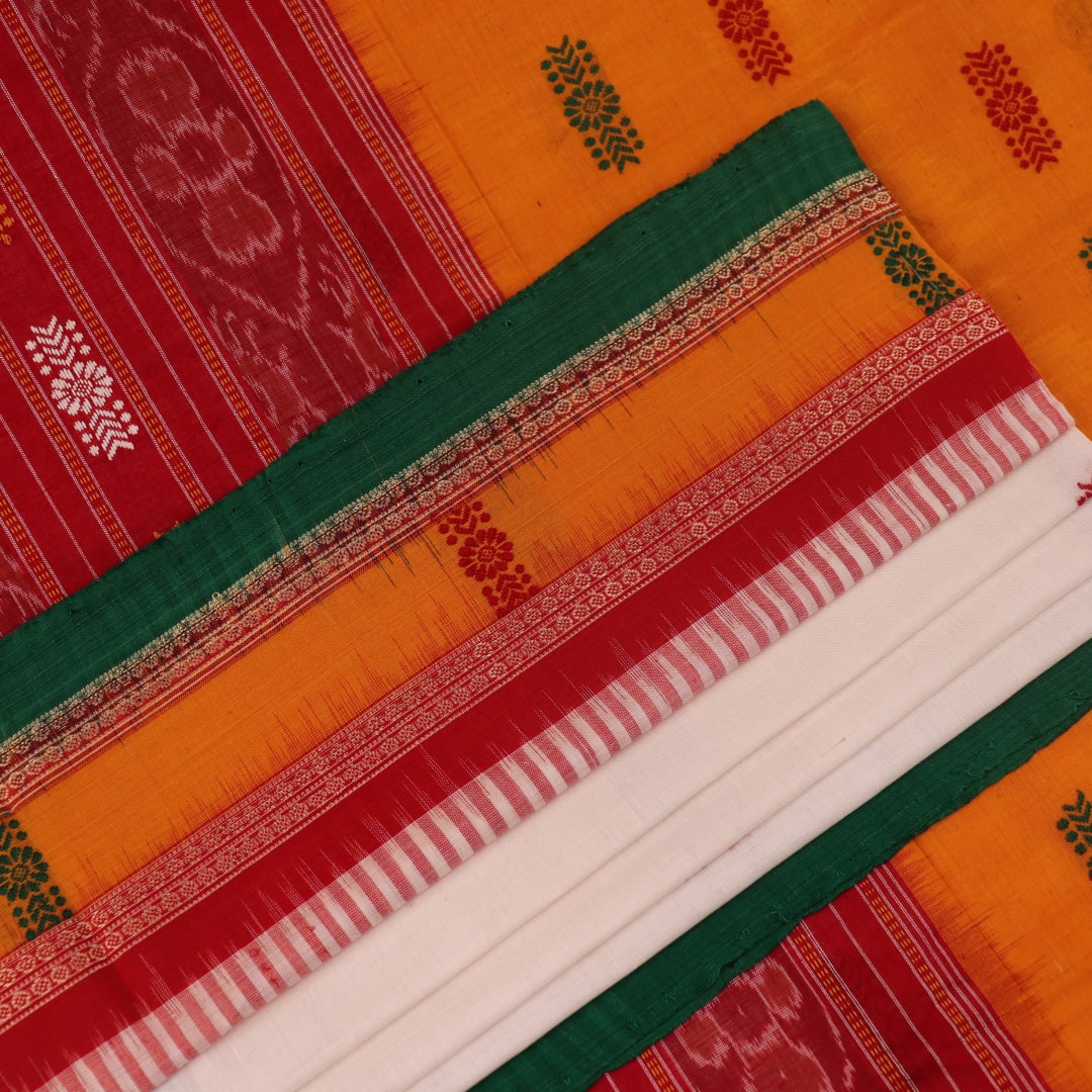 Full view of a white and green cotton handloom Bomkai saree with butta pattern.