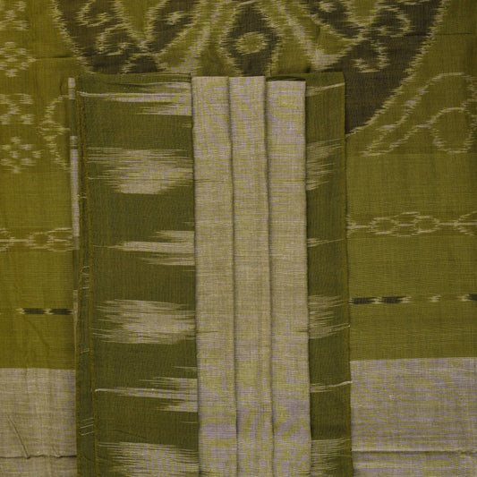 Full styling view of a model draped in a plain green Sambalpuri cotton saree with traditional accents.