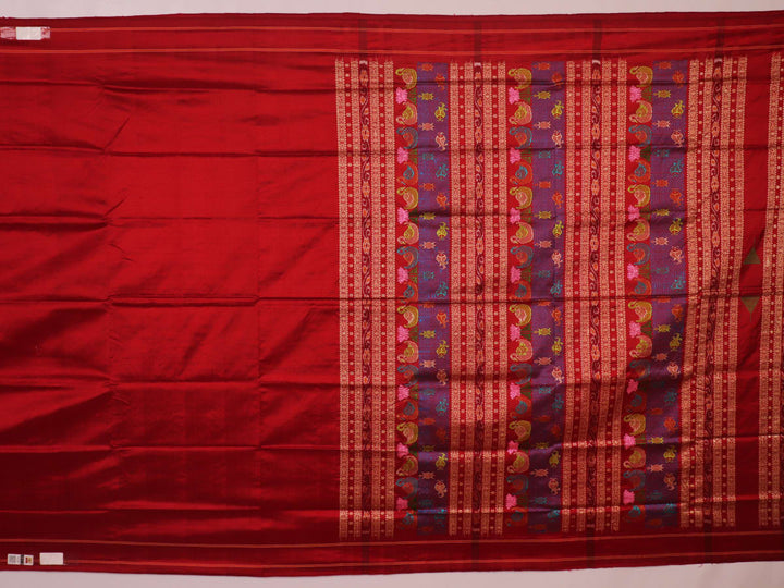 Close-up of maroon plain Sambalpuri silk saree fabric texture.