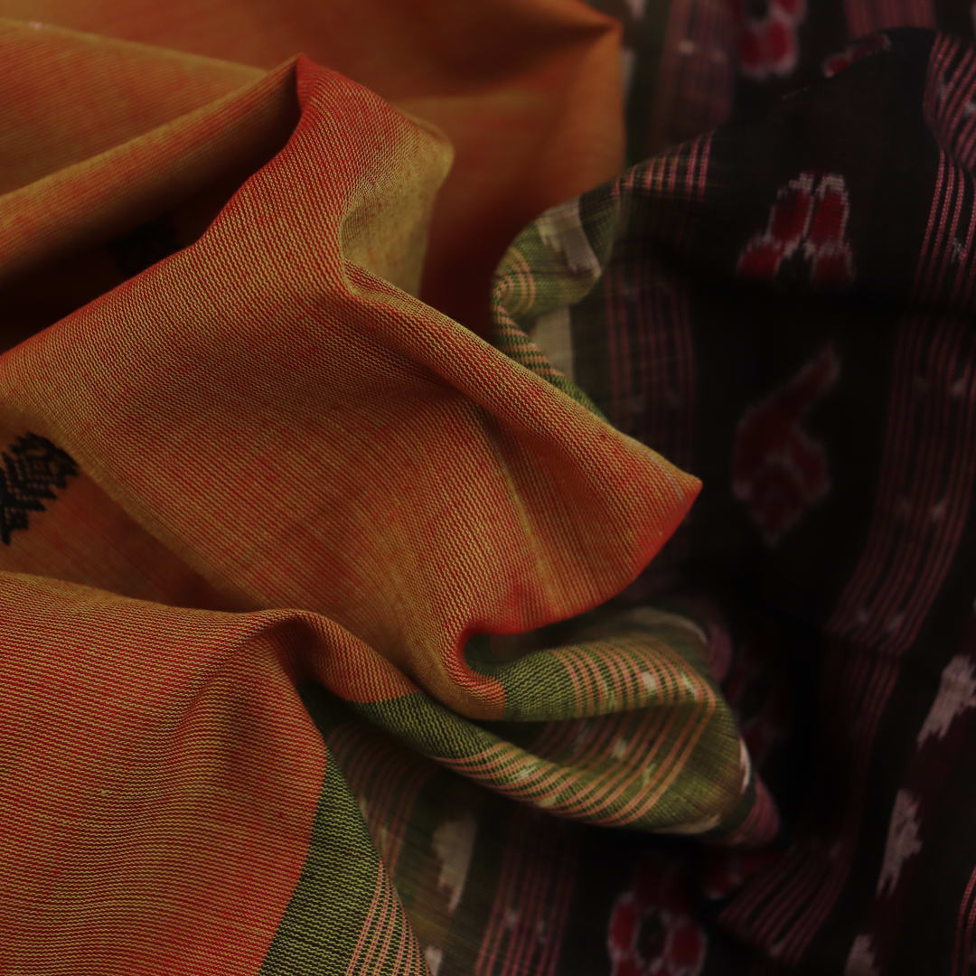 Full view of a multi-color and black Sambalpuri cotton saree with butta pattern.
