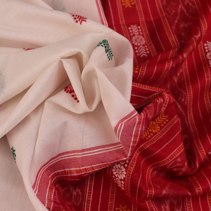 Full view of a white and green cotton handloom Bomkai saree with butta pattern.