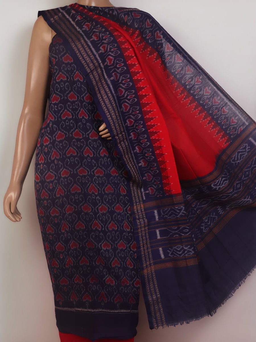 Blouse piece detail of blue & red Sambalpuri cotton dress material with motifs.
