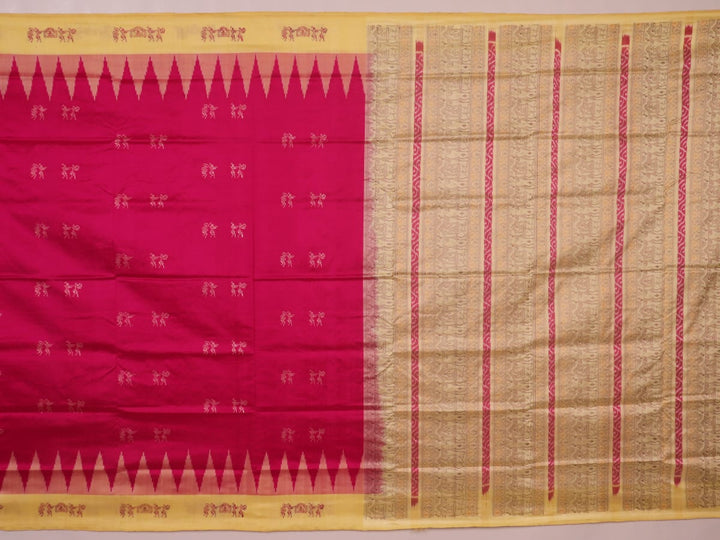 Close-up texture of pink and cream handloom Bomkai silk saree with butta pattern.