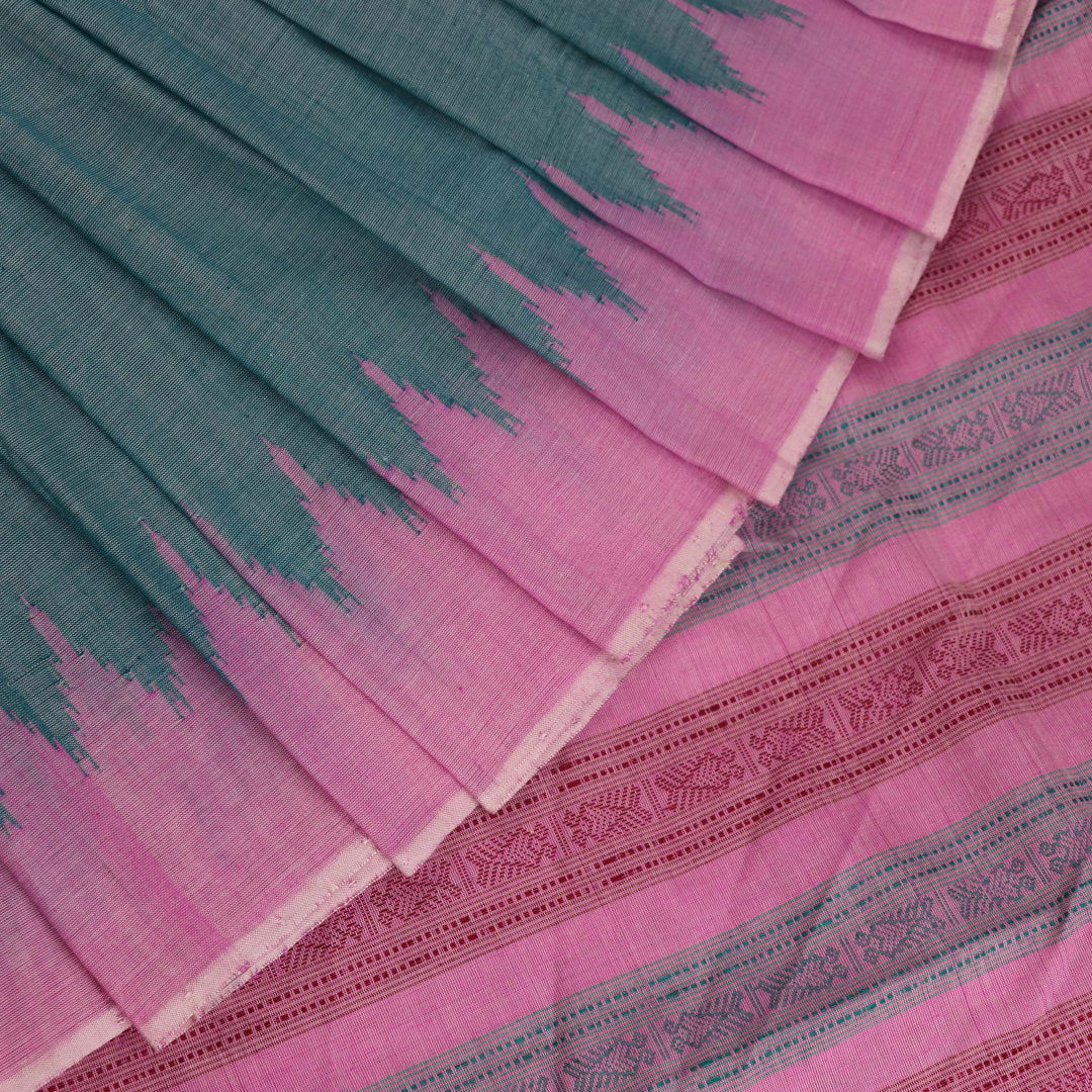 Full view of a plain handloom Sambalpuri cotton saree in green and peach.