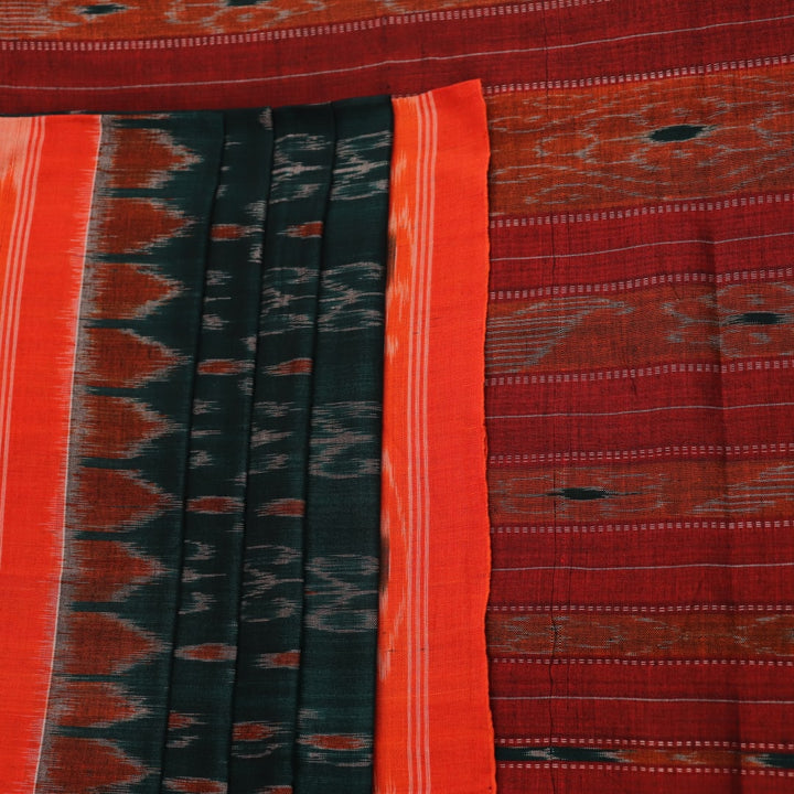 Green and orange Sambalpuri cotton saree draped, showcasing the motif pattern.