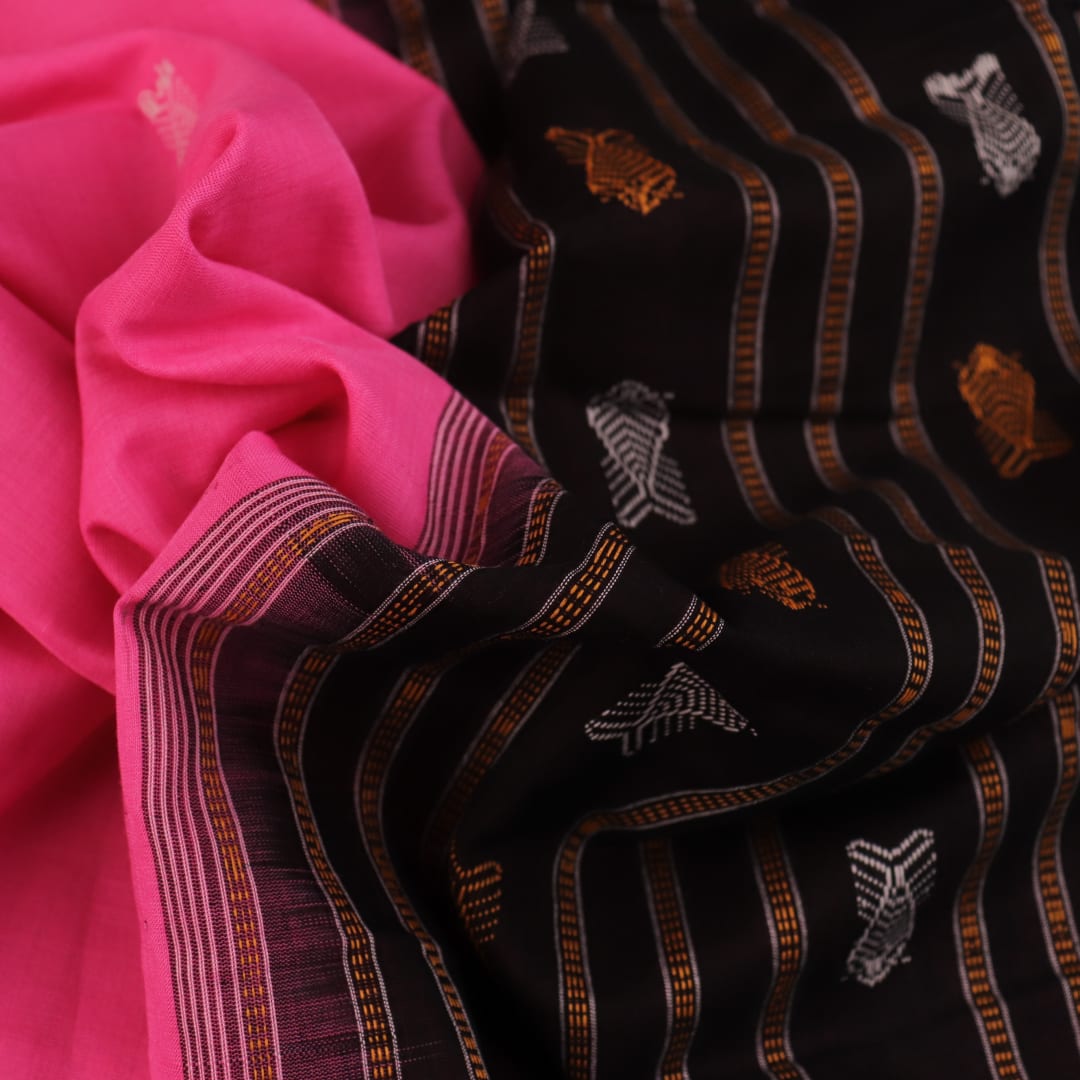 Full view of a pink and black Bomkai cotton saree with butta pattern.