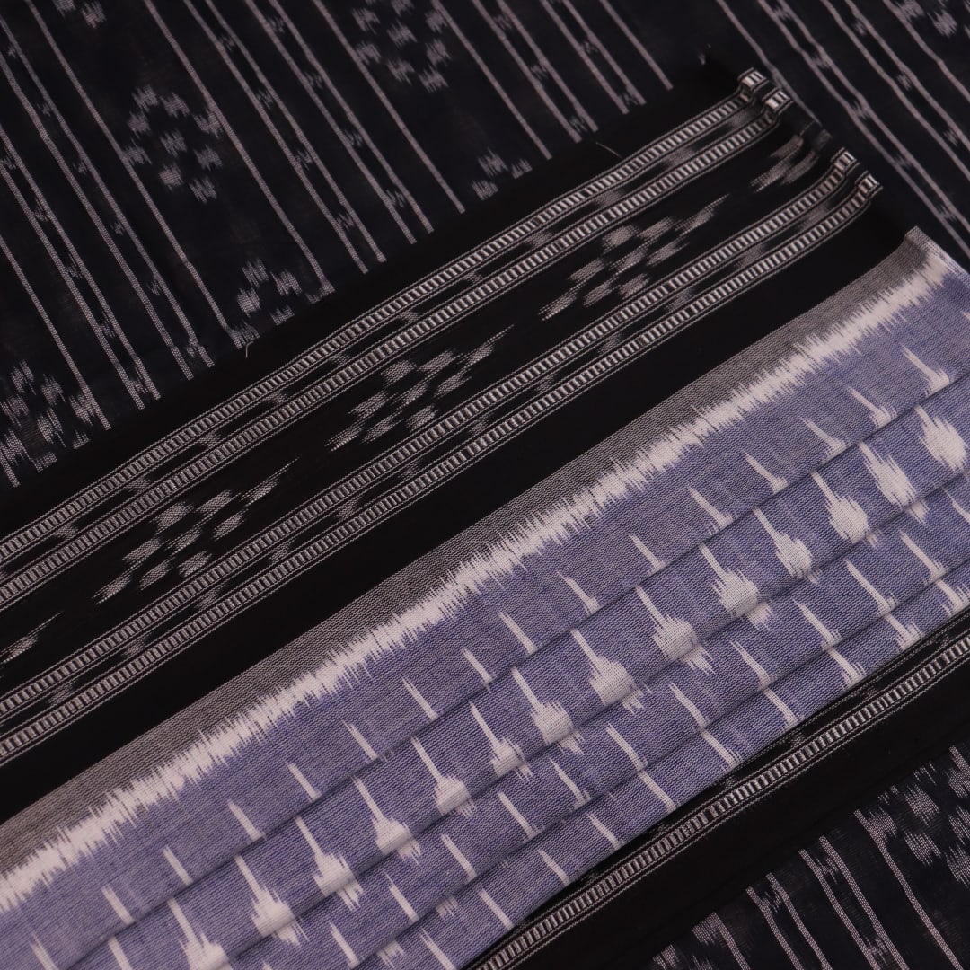 Elegantly styled and draped grey and black Sambalpuri cotton saree with motifs.