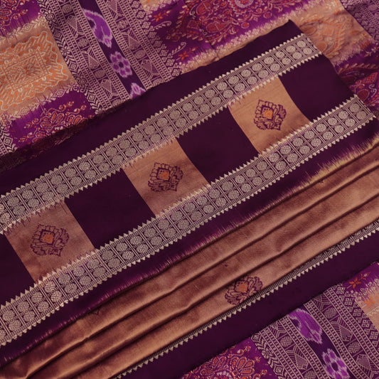 Close-up of the smooth, lustrous texture of multi-color and violet Bomkai silk saree, featuring butta weave.