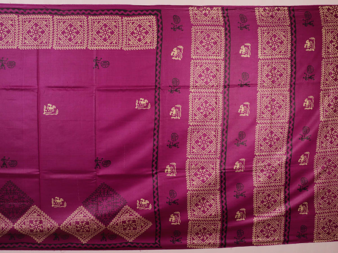 Close-up of magenta Tussar silk saree fabric, showing the printed pattern and natural slub texture.
