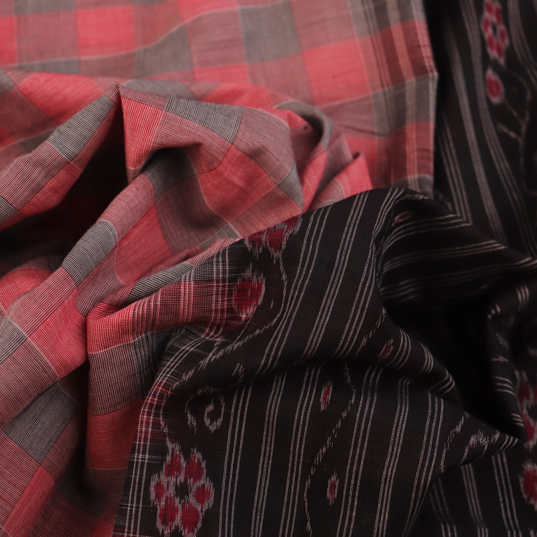 Multi-color Sambalpuri cotton saree with black and traditional motifs, full view.