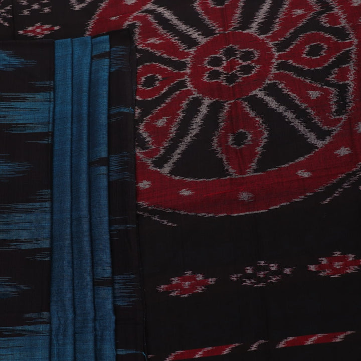 Draped plain blue and black Sambalpuri cotton saree.