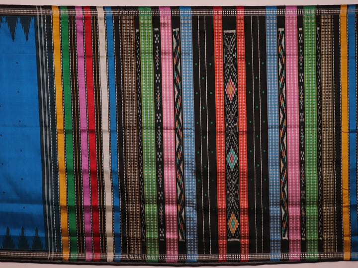 Close-up of intricate butta pattern on a silk blue and black Berhampuri saree