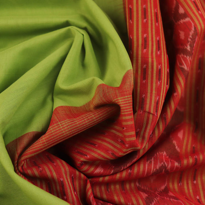 Full view of a plain green and red handloom Sambalpuri cotton saree.