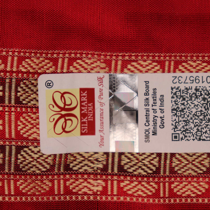 Close-up of black and red striped Sambalpuri silk saree's woven texture.