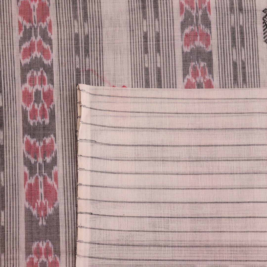Full view of a Black and White Sambalpuri Cotton Saree with Butta pattern.