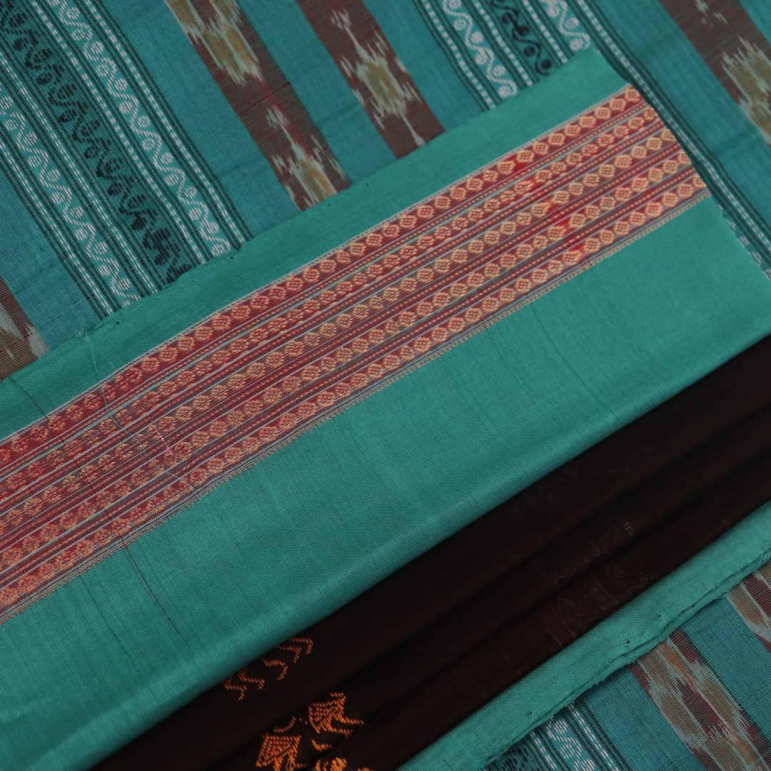Full view of a brown and green Bomkai cotton saree with Doll pattern.