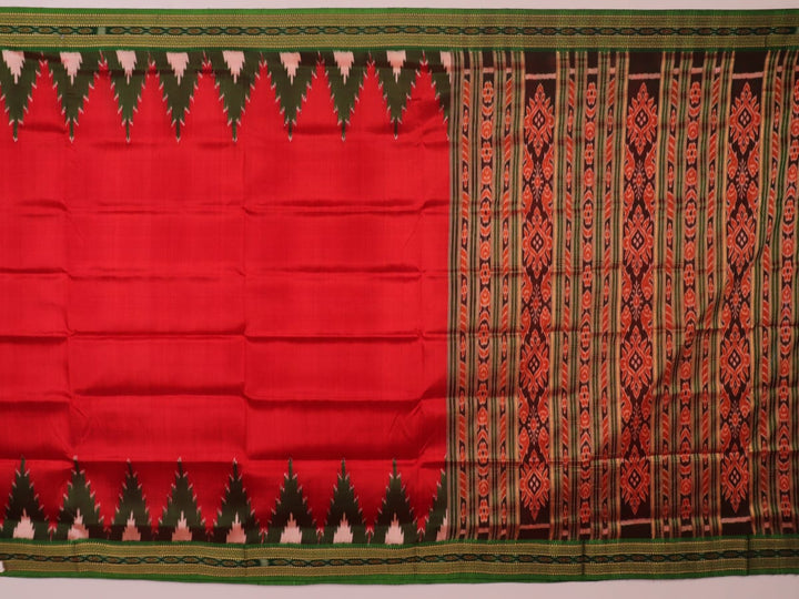 Red and green Khandua silk saree draped, showcasing the overall look and fall.