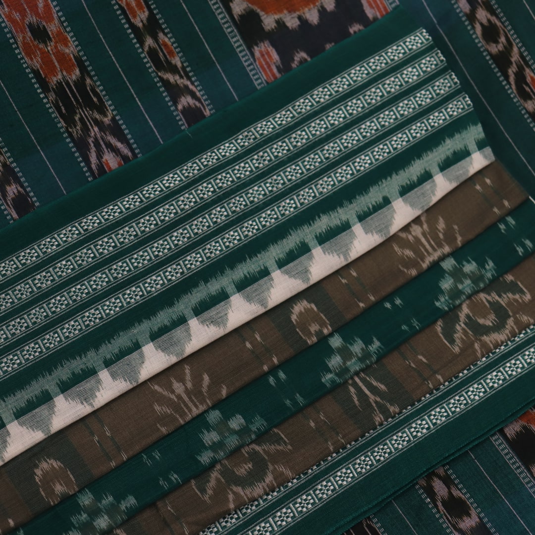 Green Sambalpuri cotton saree draped, showing styling and overall look of the handloom product.