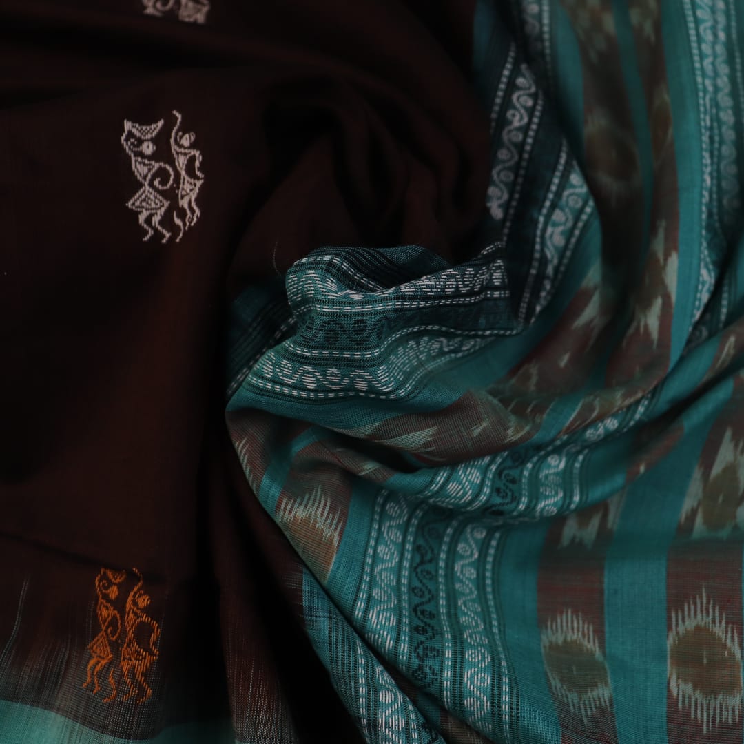 Full view of a brown and green Bomkai cotton saree with Doll pattern.