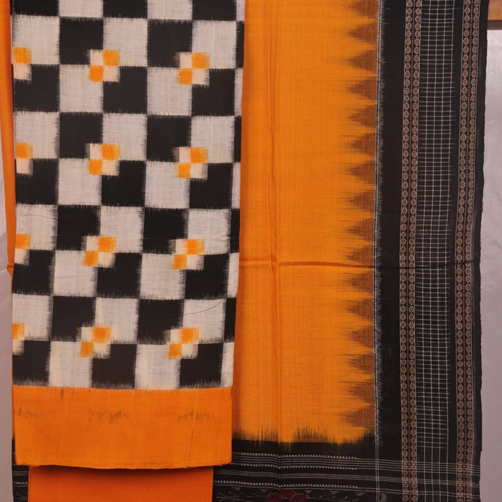Detail of the white and yellow Sambalpuri cotton dress material blouse piece, showing motifs.