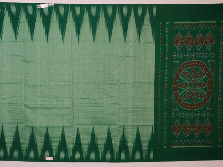 Model wearing a plain green Sambalpuri cotton saree, elegantly draped.