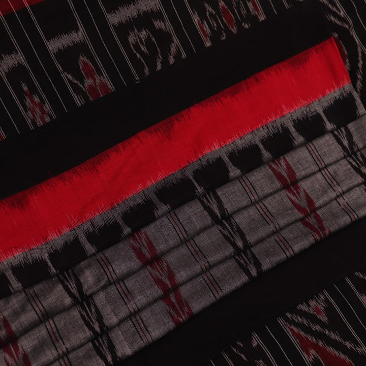 Grey and black Sambalpuri cotton saree draped, showcasing overall look and handloom texture.