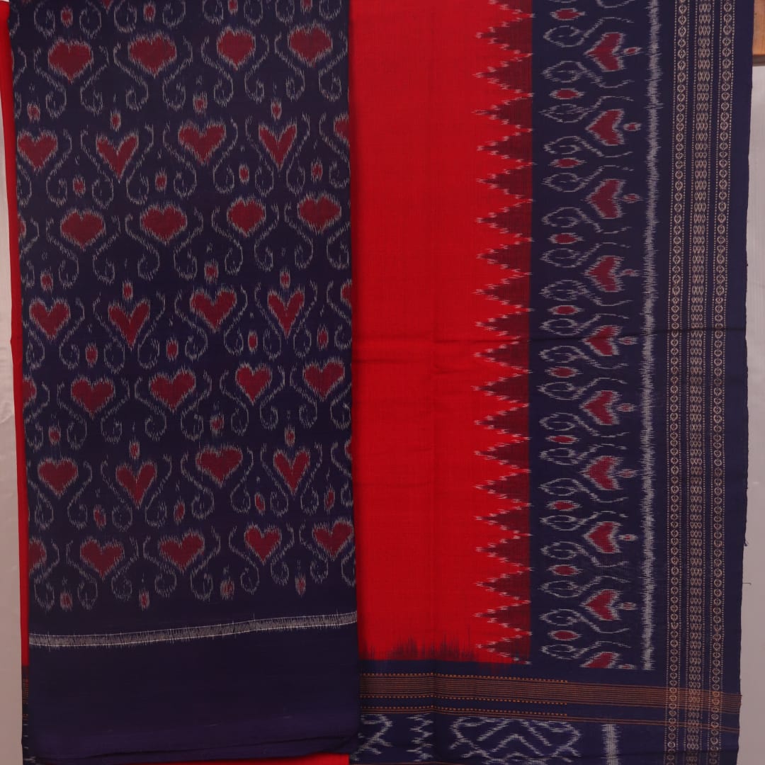 Blouse piece detail of blue & red Sambalpuri cotton dress material with motifs.