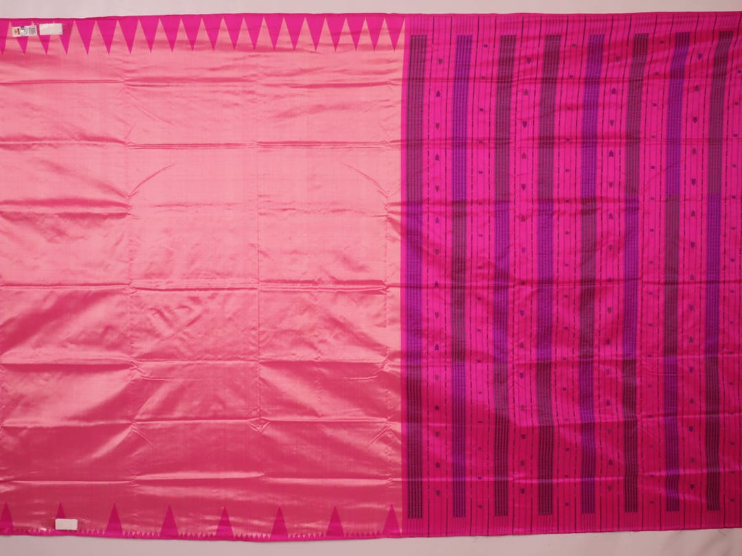 Close-up of plain peach and pink Sambalpuri silk saree fabric texture.