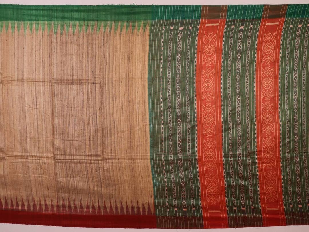 Close-up of plain off-white Tussar silk saree fabric, showing natural slub texture and rust weave.