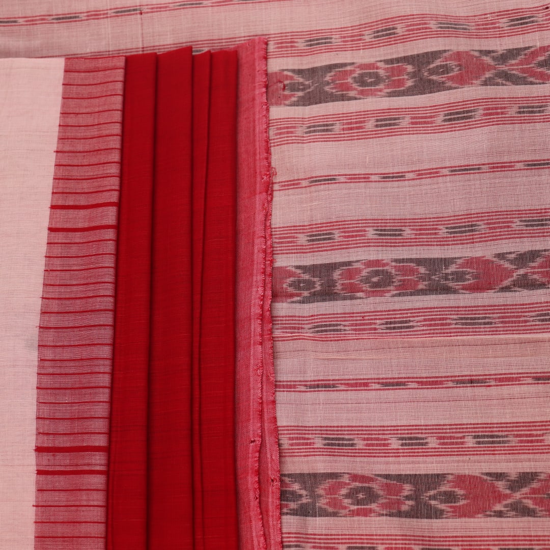 Full view of a plain red and white handloom Sambalpuri cotton saree.