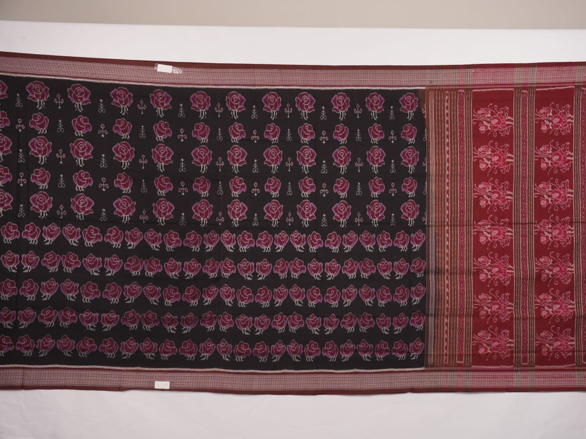 Full layout of the black and brown Sambalpuri cotton saree displaying motifs across the body and pallu.