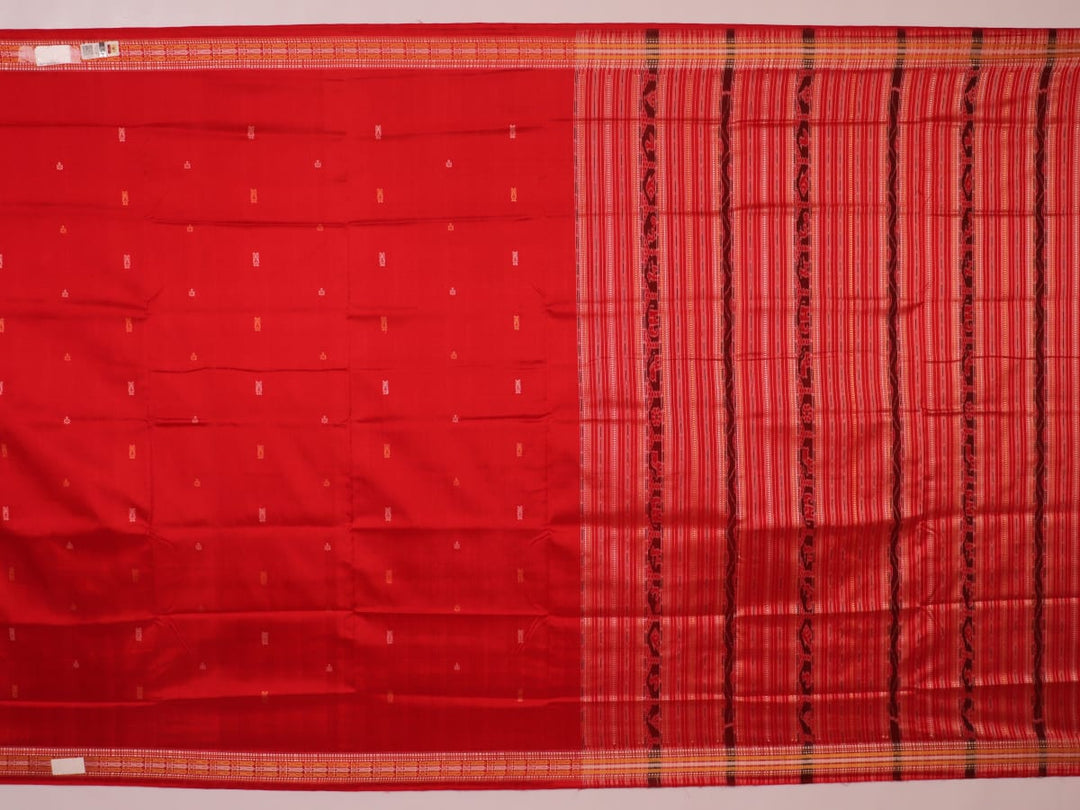 Close-up of the distinct handwoven texture of a red Sambalpuri silk saree with Butta pattern.