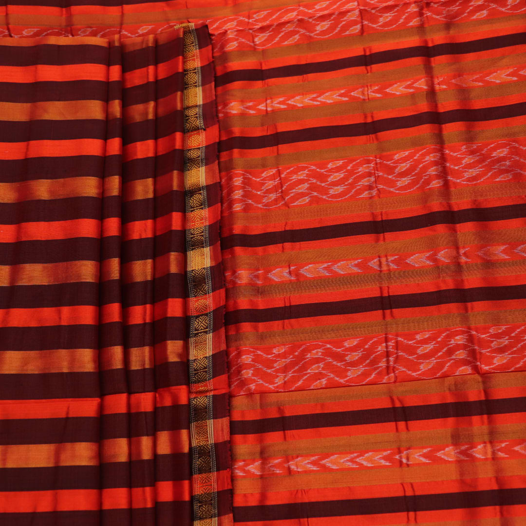 Close-up of multi-color striped Sambalpuri Silk Saree fabric texture.