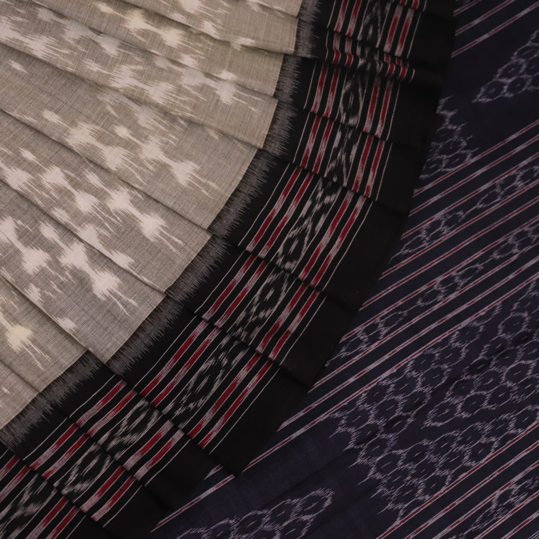 Styled Grey and Black Sambalpuri Cotton Saree with motifs, showcased draped.