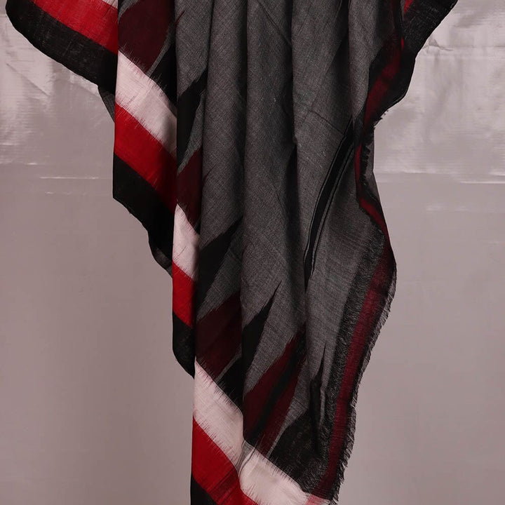 "A detailed image of the threadwork and design of a Sambalpuri Handloom Cotton Dupatta, showcasing the skillful craftsmanship of the local weavers."