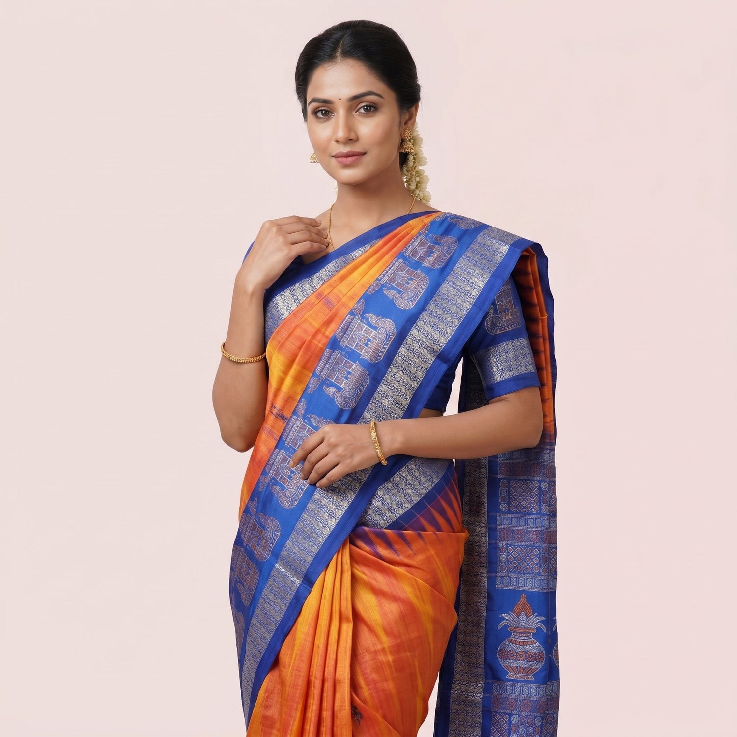 Orange Sarees Above ₹15,000