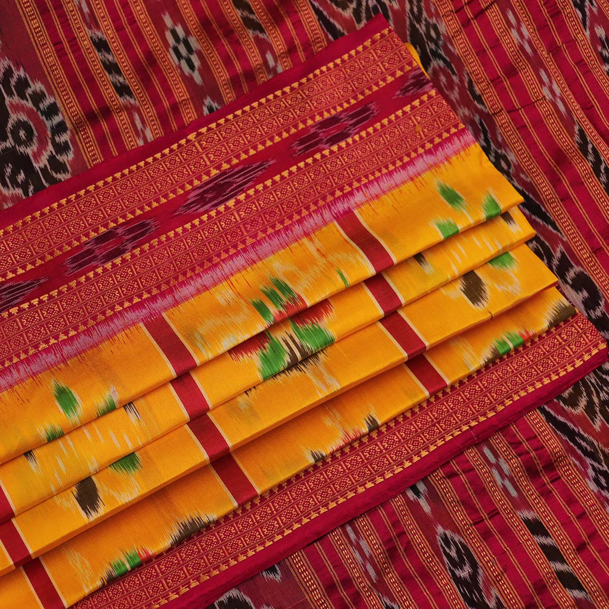 ହ୍ୟାଣ୍ଡଲୁମ୍ ଖଣ୍ଡୁଆ ସିଲ୍କ ଇକାଟ ସାରୀ |