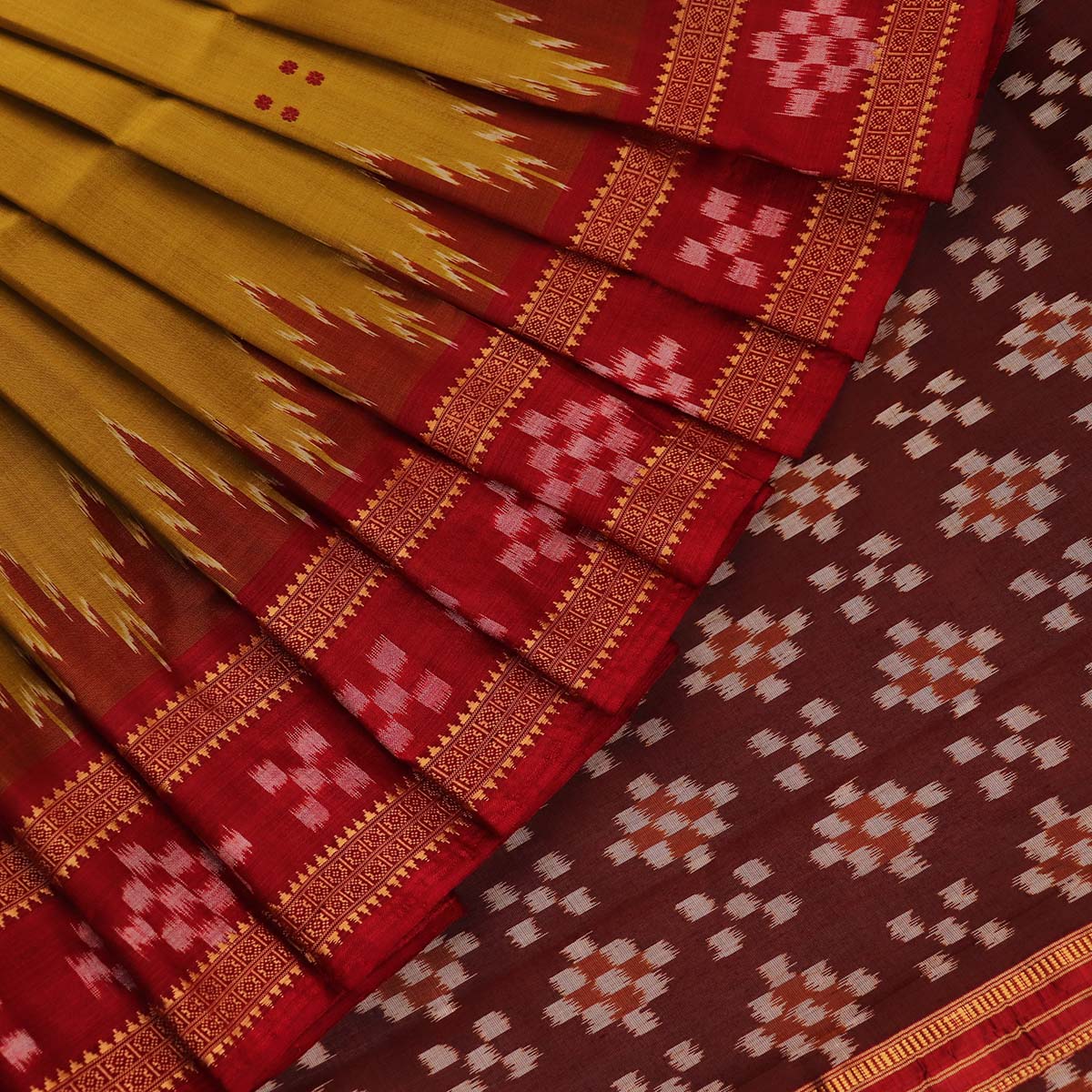 ହ୍ୟାଣ୍ଡଲୁମ୍ ଖଣ୍ଡୁଆ ସିଲ୍କ ଇକାଟ ସାରୀ |