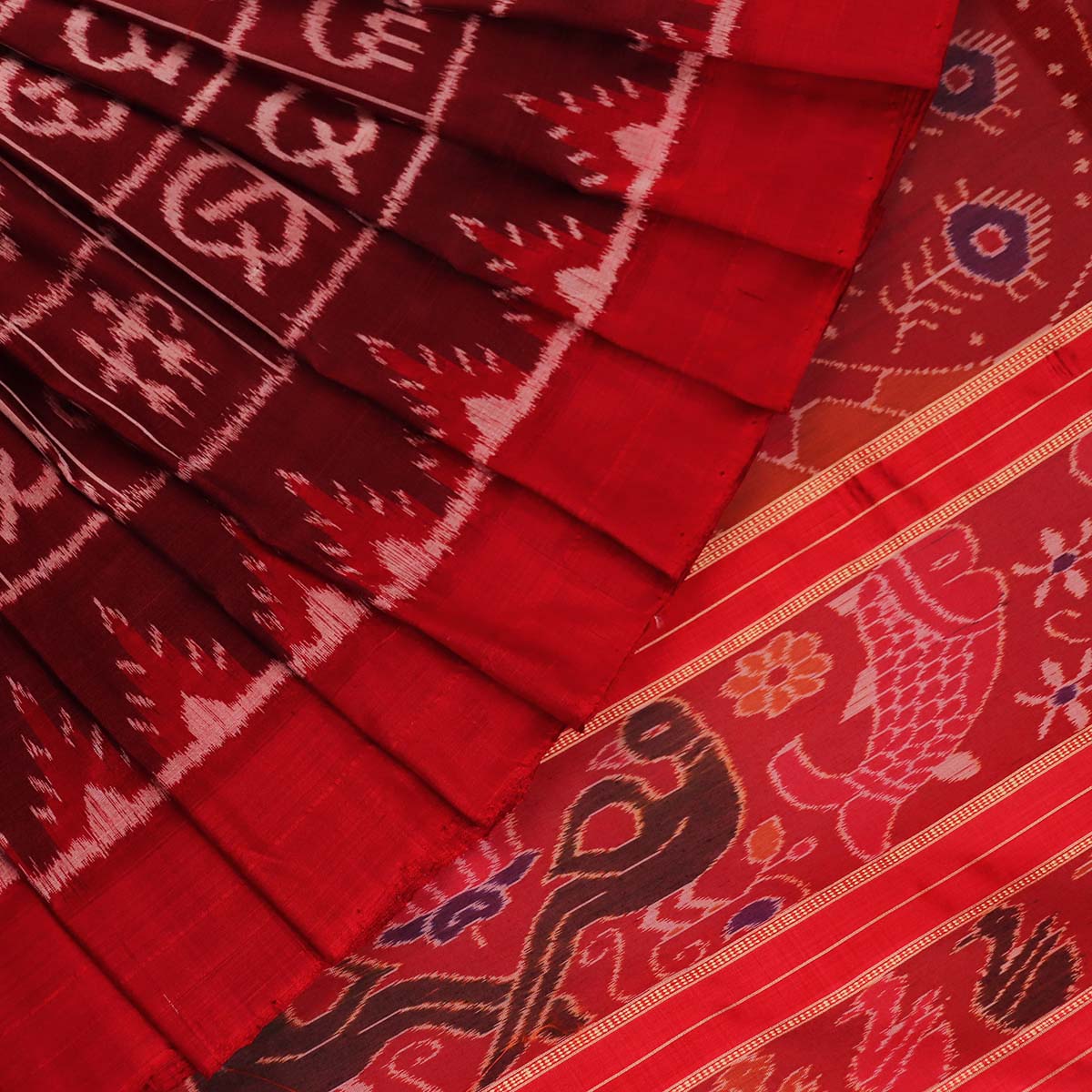ହ୍ୟାଣ୍ଡଲୁମ୍ ଖଣ୍ଡୁଆ ସିଲ୍କ ଇକାଟ ସାରୀ |