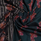 Draped view of the Green Sambalpuri cotton saree showing its handwoven texture and motifs.