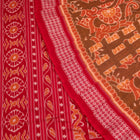 Folded presentation of the Brown and Red Sambalpuri cotton saree.