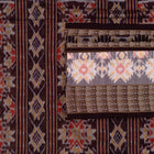 Detailed view of the handwoven motifs on the Brown Sambalpuri cotton saree.