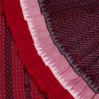 Folded presentation of the Maroon and Red Sambalpuri cotton saree.