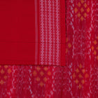 Included blouse piece and coordinated border of the Grey and Red Sambalpuri cotton saree.