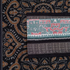 Detailed view of the handwoven motifs on the Green Sambalpuri cotton saree.