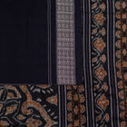 Included blouse piece and coordinated border of the Green and Black Sambalpuri cotton saree.