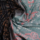 Draped view of the Green Sambalpuri cotton saree showing its handwoven texture and motifs.